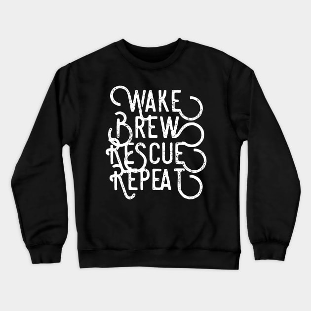 Wake Brew Rescue Repeat black distressed text design for coffee and animal rescue lovers Crewneck Sweatshirt by BlueLightDesign